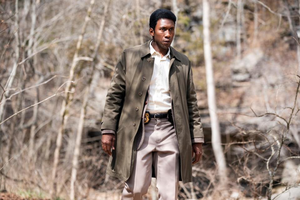 Mahershala Ali walks through the woods in "True Detective"