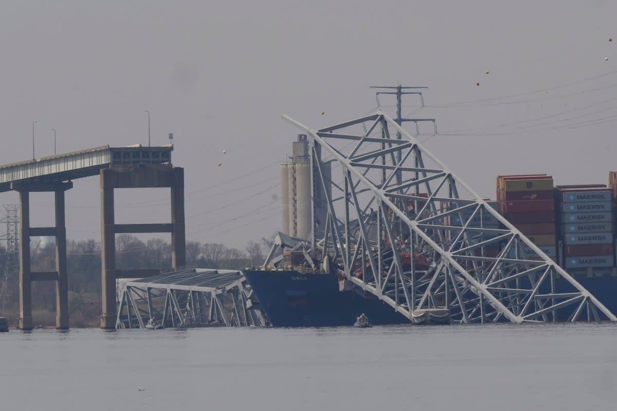 The container ship Dali rests against wreckage of the Francis Scott Key Bridge (Copyright 2024 The Associated Press. All rights reserved.)