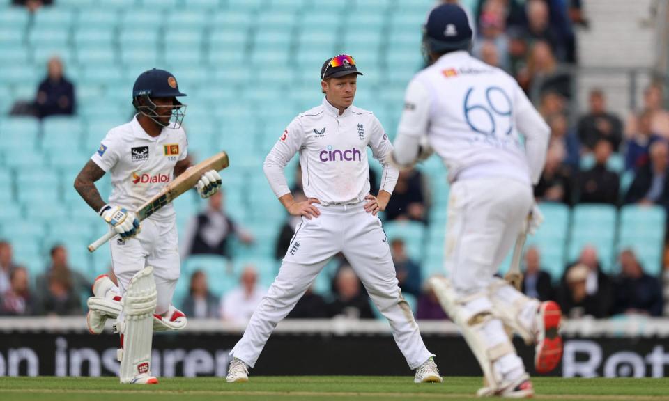 <span>Ollie Pope watches on as Sri Lanka reach their target with ease on day four.</span><span>Photograph: Paul Childs/Action Images/Reuters</span>