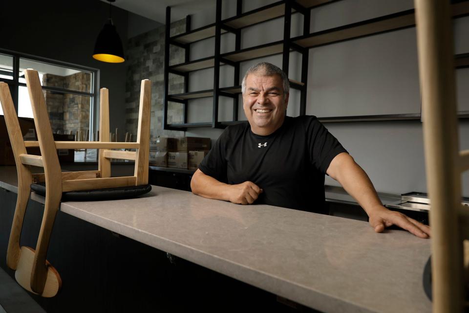 Chef Jean Marie Josselin behind the bar as he is putting the final touches on his soon-to-open new restaurant, Rustica at Saint Johns, in  SilverLeaf Commons near St. Augustine.