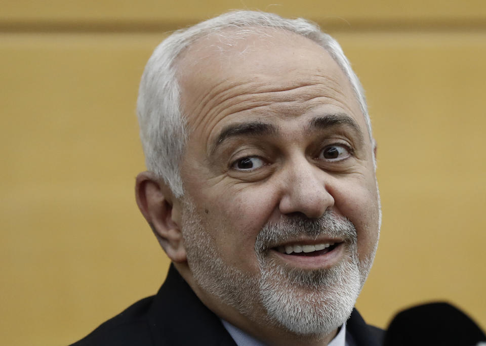 Iran's Foreign Minister Mohammad Javad Zarif speaks to journalists on his arrival at Rafik Hariri Airport, in Beirut, Lebanon, Sunday, Feb. 10, 2019. Zarif says his country is ready to cooperate with the new Lebanese government, offering his country's support in all sectors. (AP Photo/Hussein Malla)