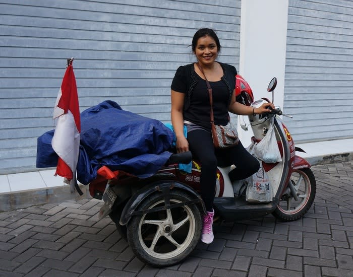 Shinta during her visit to The Jakarta Post Travel's office: Prior to her record-setting journey, Shinta was busy in community groups. After receiving her modified scooter, she wasted no time in exploring places she wanted to see.