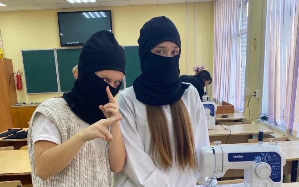 Russian schoolgirls sport their handmade balaclavas