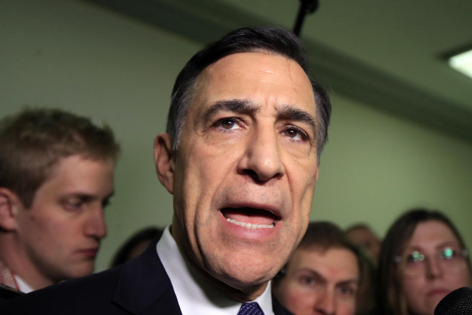 FILE - In this Dec. 7, 2018 file photo Rep. Darrell Issa, R-Calif., speaks to reporters as he leaves a House Judiciary and Oversight Committee closed-door interview on Capitol Hill in Washington. Issa has taken a step toward challenging indicted U.S. Rep. Duncan Hunter for a Southern California seat. Issa says on his website that he formed an exploratory committee to replace fellow Republican Hunter, who is scheduled to be tried in January for allegedly siphoning campaign money for personal use. The committee allows Issa to raise money. (AP Photo/Manuel Balce Ceneta,File)