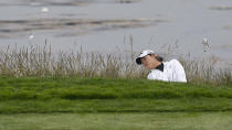 Rose Zhang hits from a bunker to the fifth green during the first round of the U.S. Women's Open golf tournament at the Pebble Beach Golf Links, Thursday, July 6, 2023, in Pebble Beach, Calif. (AP Photo/Darron Cummings)