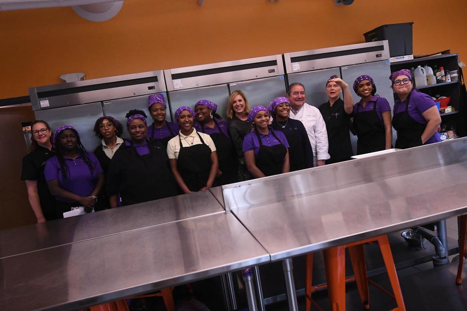 Students in the culinary classroom at GLOW Academy were able to meet with Emeril Lagasse and serve guests dishes they created in the kitchen as he visited GLOW Academy Thursday.