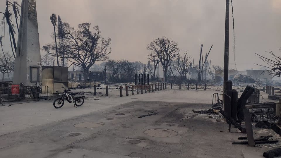 Destroyed buildings smolder after the wildfires in Lahaina. - From Mason Jarvi/Reuters