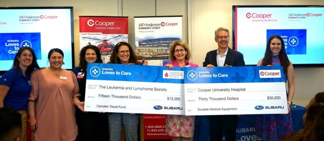 At the presentation: (left to right): *Shira Haaz, Corporate Responsibility Manager, Subaru of America* *Gabby Grimaldi, Campaign Development Manager, The Leukemia & Lymphoma Society – NJ Region* *Dina Mathews-Laurendeau, Director of Development, The Cooper Foundation* *Generosa Grana, MD, director of MD Anderson Cancer Center at Cooper* *Christine Winn, Senior Vice President of Ambulatory Operations at Cooper University Health Care* *Steven Kaufman, MD, medical director Urban Health Institute at Cooper University Health Care* *Liz Edelen, Love Promise Community Commitment Manager, Subaru of America, Inc.*