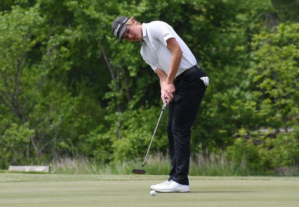 Gilbert's Joey Currans looks at the ball after putting it onto the first hole in the class 3A boys state golf tournament first round at Veenkeer Golf Course on Monday in Ames, Iowa.
