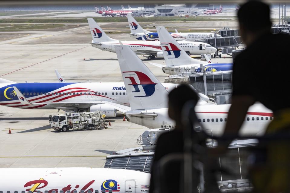 Malaysian Airlines aircraft on the tarmac at the Kuala Lumpur International Airport.