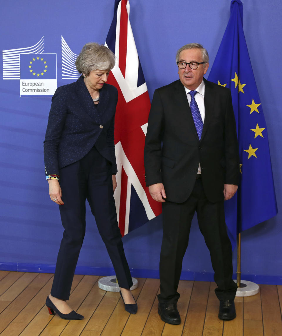 European Commission President Jean-Claude Juncker greets British Prime Minister Theresa May before their meeting at the European Commission headquarters in Brussels, Thursday, Feb. 7, 2019. (AP Photo/Francisco Seco)