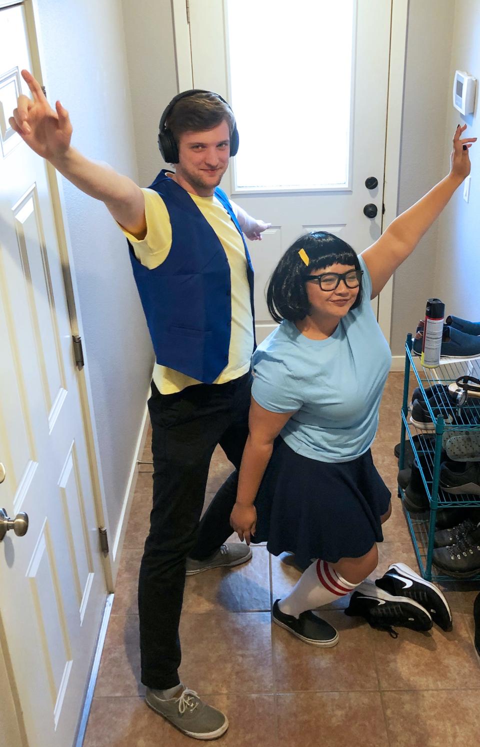 A man dressed as Jimmy Jr. and a woman dressed as Tina Belcher from "Bob's Burgers" pose for a photo.