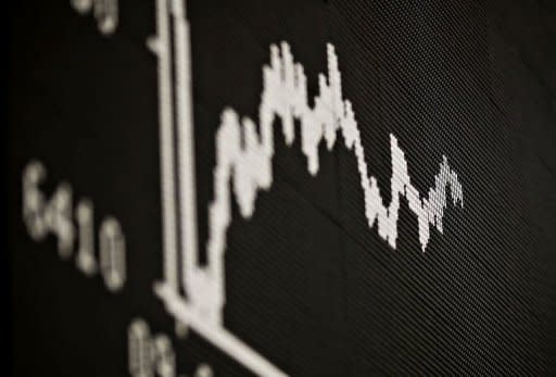 A display shows the German Stock Market Index DAX. Most European stock markets closed higher on Monday despite the prospects for political and financial turmoil in Greece following general elections there a day earlier