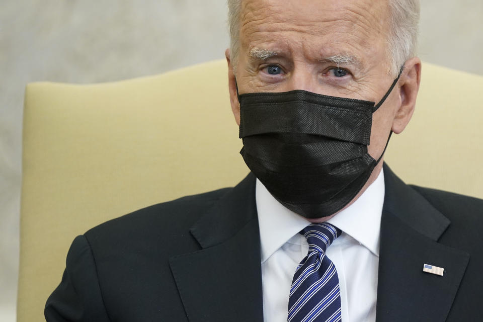 President Joe Biden speaks as he and Vice President Kamala Harris meet with members of the Congressional Black Caucus in the Oval Office of the White House, Tuesday, April 13, 2021, in Washington. (AP Photo/Patrick Semansky)