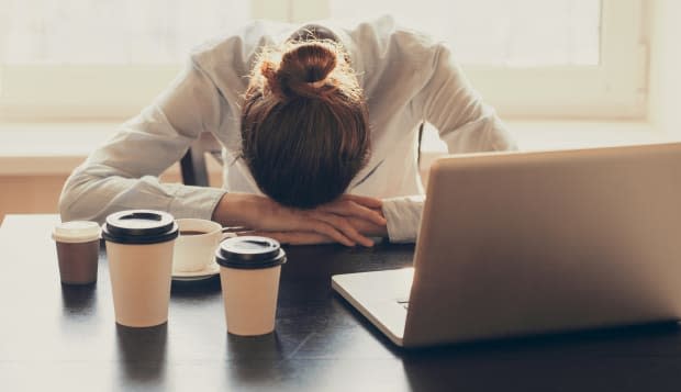 Tired woman in the office