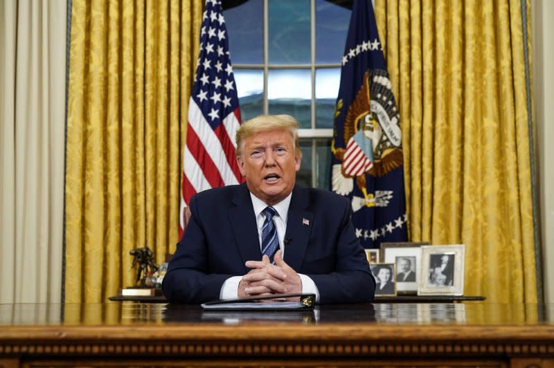 Then-President Donald Trump delivers a primetime address on his administration's response to the coronavirus from the Oval Office of the White House on March, 11, 2020. File Photo by Doug Mills/UPI