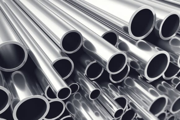 A stack of steel tubular pipes.