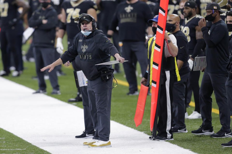 FILE - In this Sunday, Nov. 22, 2020 file photo, New Orleans Saints head coach Sean Payton reacts on the sideline in the first half of an NFL football game against the Atlanta Falcons in New Orleans. The NFL has fined the New Orleans Saints $500,000 and stripped them of a 2021 seventh-round draft pick for violating league COVID-19 protocols, a person with direct knowledge of the discipline told The Associated Press on Sunday, Nov. 29. New Orleans was fined as a repeat offender; Payton previously was docked $150,000 and the team $250,000 because the head coach failed to properly wear a face covering against the Raiders in Week 2. (AP Photo/Brett Duke, File)