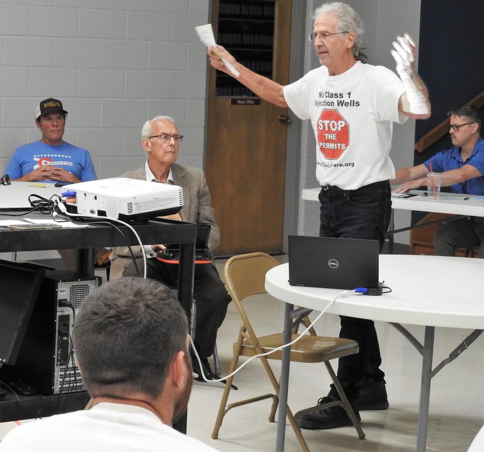 Tim Kettler gives testimony regarding Buckeye Brine seeking a permit to drill a fourth well at its facility on Airport Road doing an Ohio Environmental Protection hearing at Roscoe United Methodist Church.