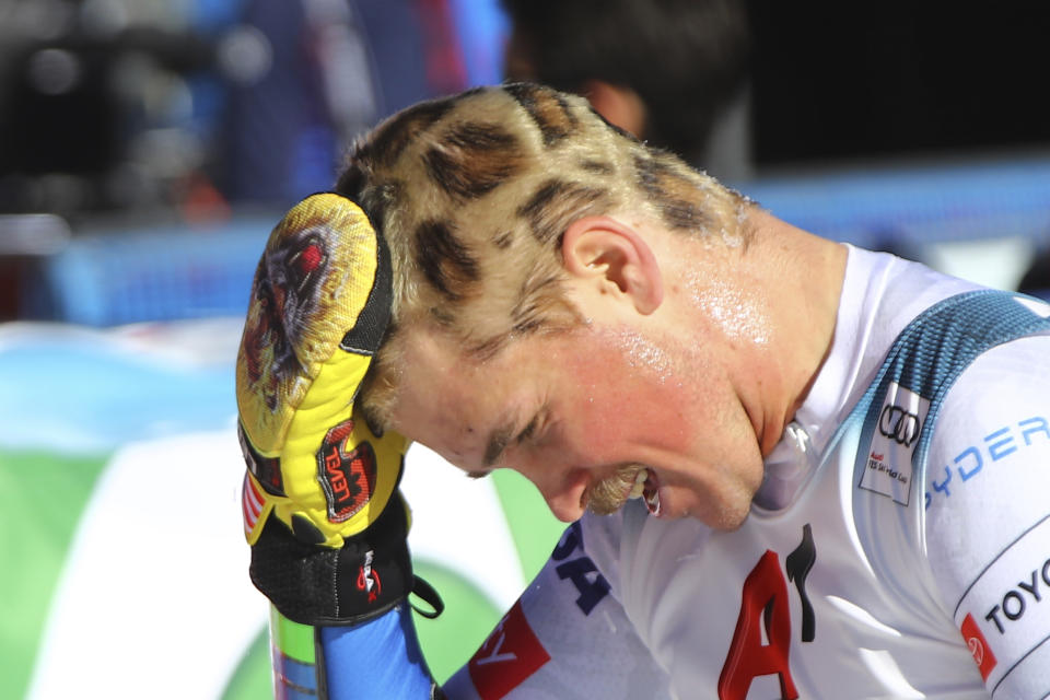 United States' River Radamus gestures after crossing the finish line during an alpine ski, men's World Cup giant slalom, in Soelden, Austria, Sunday, Oct. 24, 2021. (AP Photo/Marco Trovati)