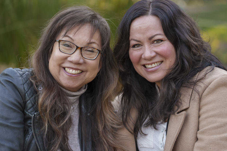 Anna Wong, niece of the late actress Anna May Wong, left, poses with Shannon Lee, daughter of the late martial arts actor Bruce Lee, at Douglas Park in Santa Monica, Calif., on Tuesday, March 7, 2023. They both discovered parallel experiences protecting the legacy of a family member who happens to be a Hollywood and Asian American icon. (AP Photo/Damian Dovarganes)