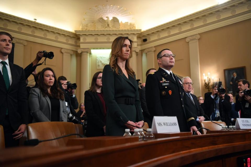 Nov 19, 2019;  Washington, DC, USA; Jennifer Williams, a foreign policy aide to Vice President Mike Pence, 2nd from left, and Lieutenant Colonel Alexander Vindman, a Ukraine expert for the National Security Council, arrive to testify on Nov. 19, 2019 before the Permanent Select Committee on Intelligence.