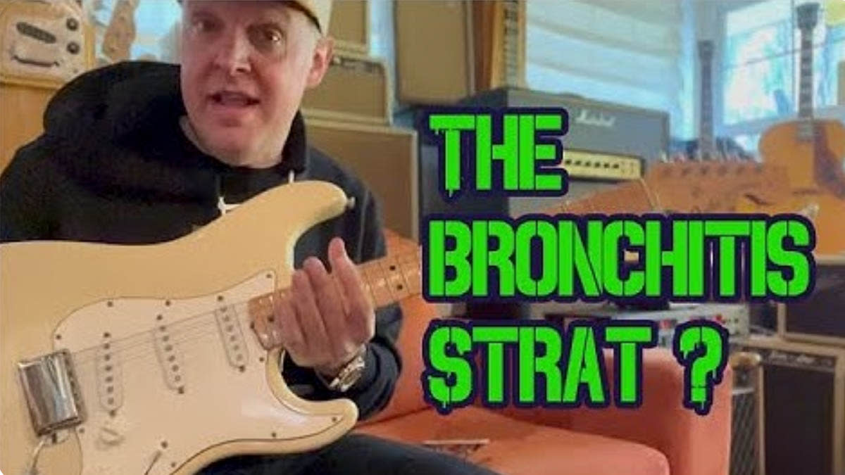  Joe Bonamassa holds his “Bronchitis Strat”. 