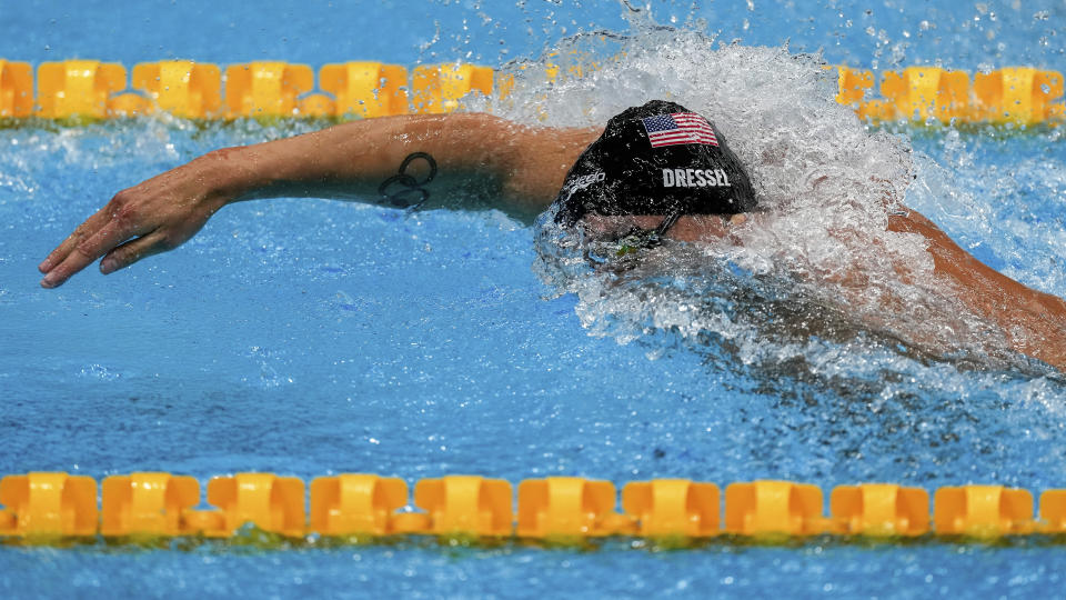 <p>Caeleb Dressel, of the United States, swims in a men's 100-meter freestyle semifinal at the 2020 Summer Olympics, Wednesday, July 28, 2021, in Tokyo, Japan. (AP Photo/Charlie Riedel)</p> 