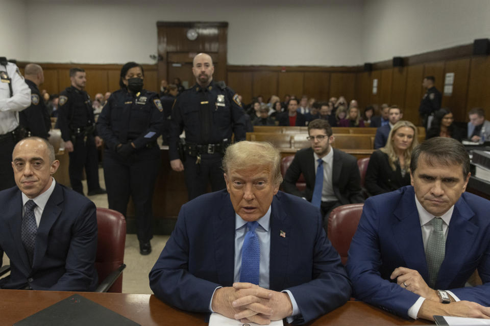 Former President Donald Trump appears at Manhattan criminal court before his trial in New York, Friday, April 26, 2024. (Jeenah Moon/Pool Photo via AP)