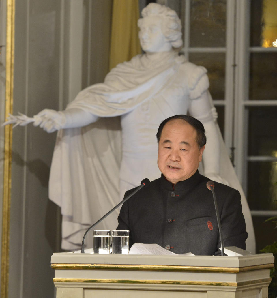 The 2012 Nobel Literature Prize laureate, Mo Yan of China speaks during the traditional Nobel lecture Friday Dec. 7, 2012 at the Royal Swedish Academy in Stockholm, Sweden. (AP Photo/Jonas Ekstromer)