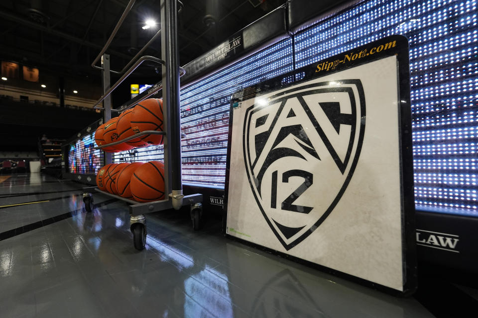 The PAC-12 logo is displayed on the traction mat used in front of the scorer's table of the Events Center before the final conference regular-season NCAA college basketball game Sunday, March 3, 2024, in Boulder, Colo. (AP Photo/David Zalubowski)
