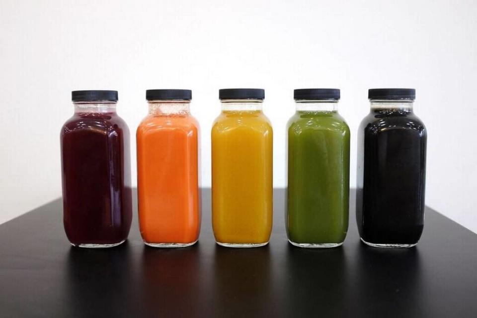 Cold-pressed juices like these are available at Reinvent Juicery’s newest location in Fig Garden Village.