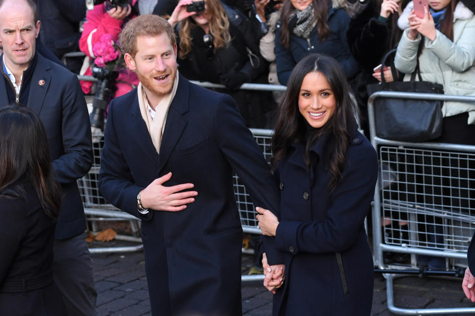 The couple appeared relaxed and happy, choosing to hold hands and wrap their arms around each other.