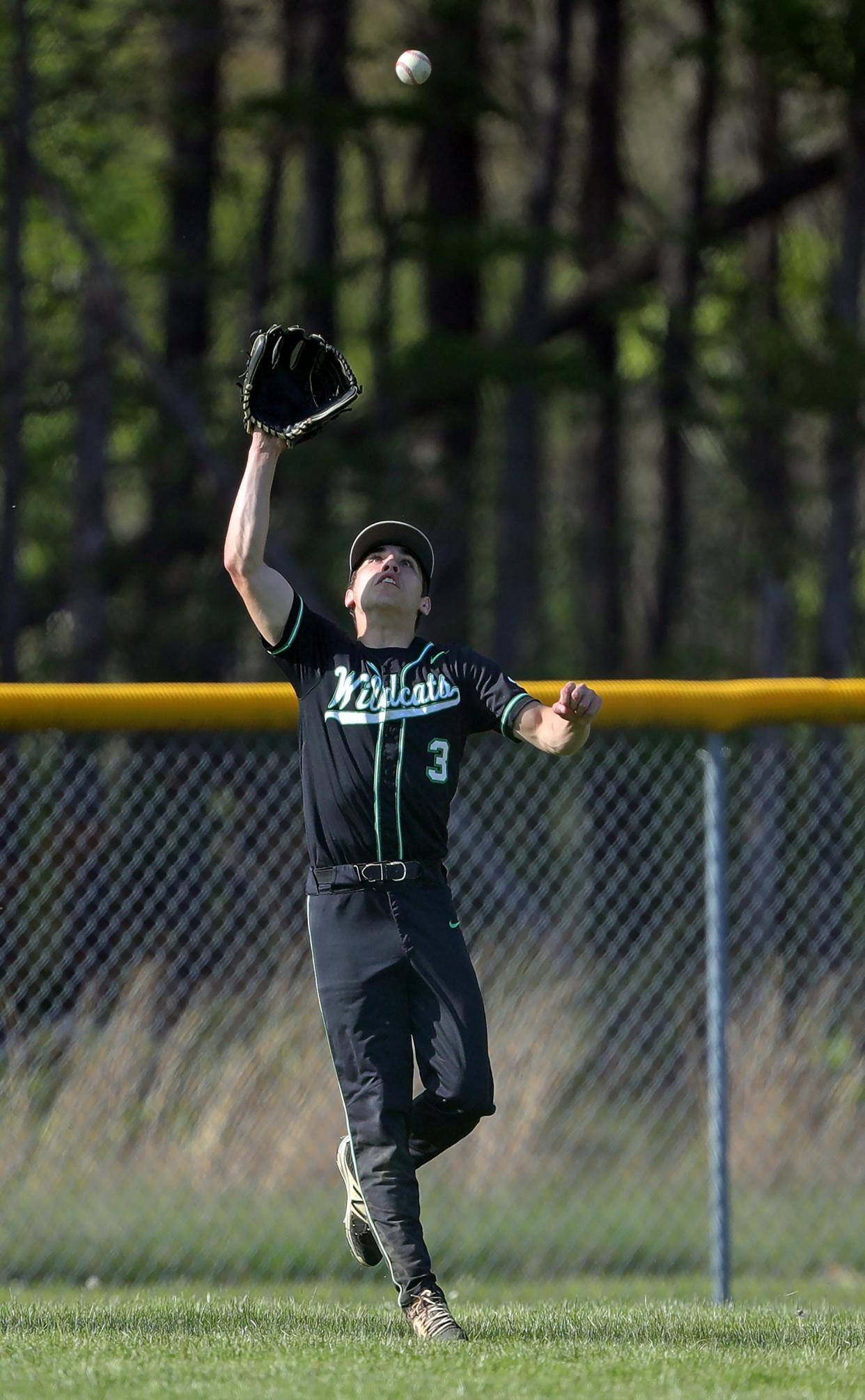 Mogadore left fielder Corey Lehner gets under a shot by Garfield batter Aiden Hill for an out during the second inning of a high school baseball game, Wednesday, May 1, 2024, in Garrettsville, Ohio.