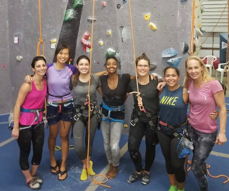 Founder Abby Dione (center) at Coral Cliffs Climbing Gym (Photo: Courtesy Abby Dione)