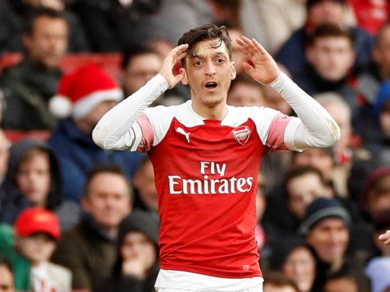 Ozil's agent insists the midfielder is happy at Arsenal for the foreseeable future (Action Images via Reuters)