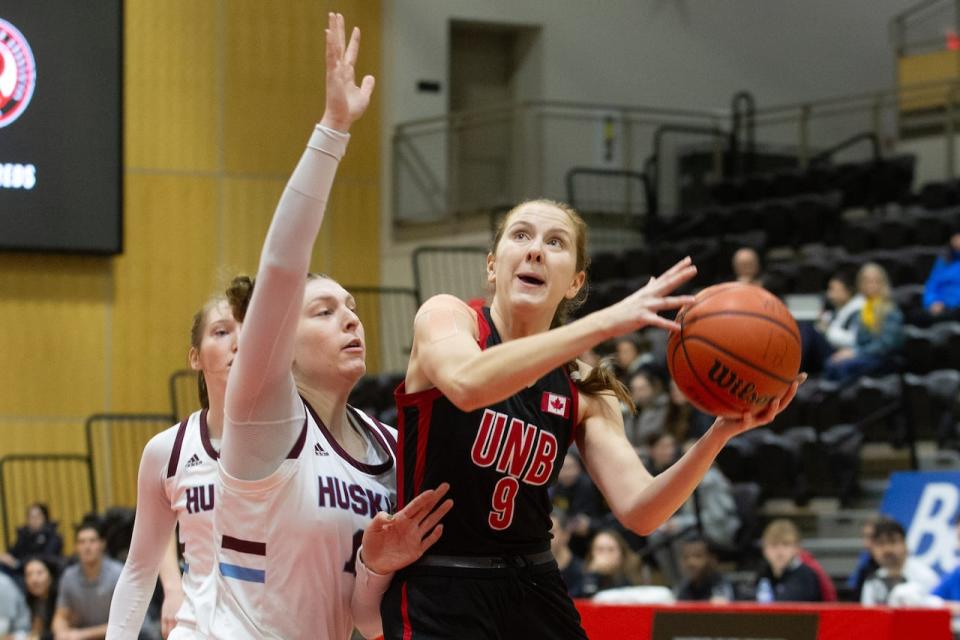 Veinot, in black, seen here playing against the Saint Mary's University team on Jan. 13. She was second in the Atlantic university region for individual statistics during the 2023-24 season. 