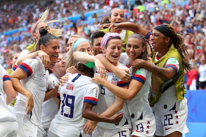 LYON, FRANCE - JULY 07: Megan Rapinoe of the USA celebrates with teammates after scoring her team's first goal during the 2019 FIFA Women's World Cup France Final match between The United States of America and The Netherlands at Stade de Lyon on July 07, 2019 in Lyon, France. (Photo by Richard Heathcote/Getty Images) *** BESTPIX *** ** OUTS - ELSENT, FPG, CM - OUTS * NM, PH, VA if sourced by CT, LA or MoD **