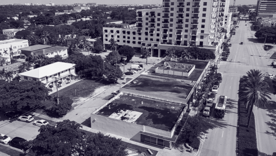 An aerial view of 1424 Ponce de Leon Blvd, which is partly owned by Coral Gables Mayor Vince Lago on Monday, Aug. 14, 2023, in Coral Gables, Fla. Developer Rishi Kapoor had been renting the property from the mayor, with plans to use it as a sales center for his 1505 Ponce project directly across the street.