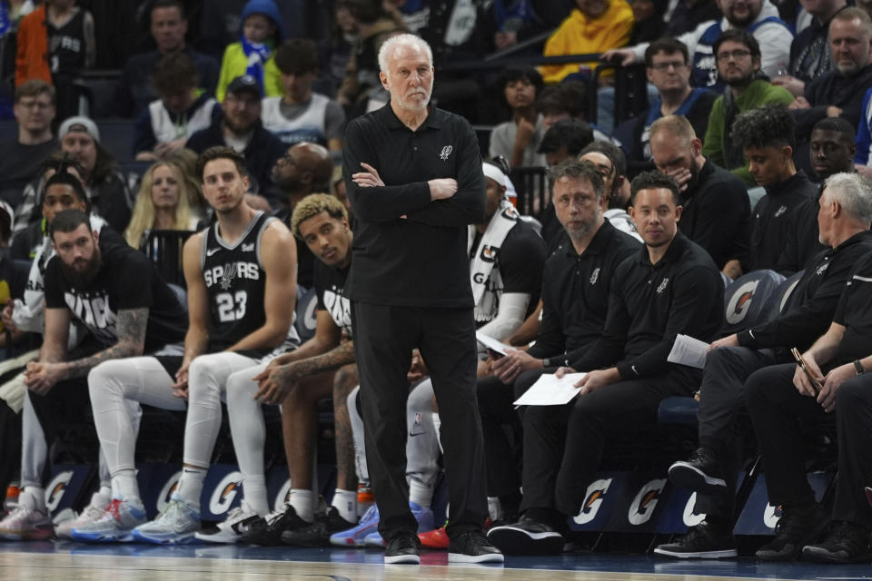 San Antonio Spurs coach Gregg Popovich watches play during the second half of the team's NBA basketball game against the Minnesota Timberwolves, Tuesday, Feb. 27, 2024, in Minneapolis. (AP Photo/Abbie Parr)