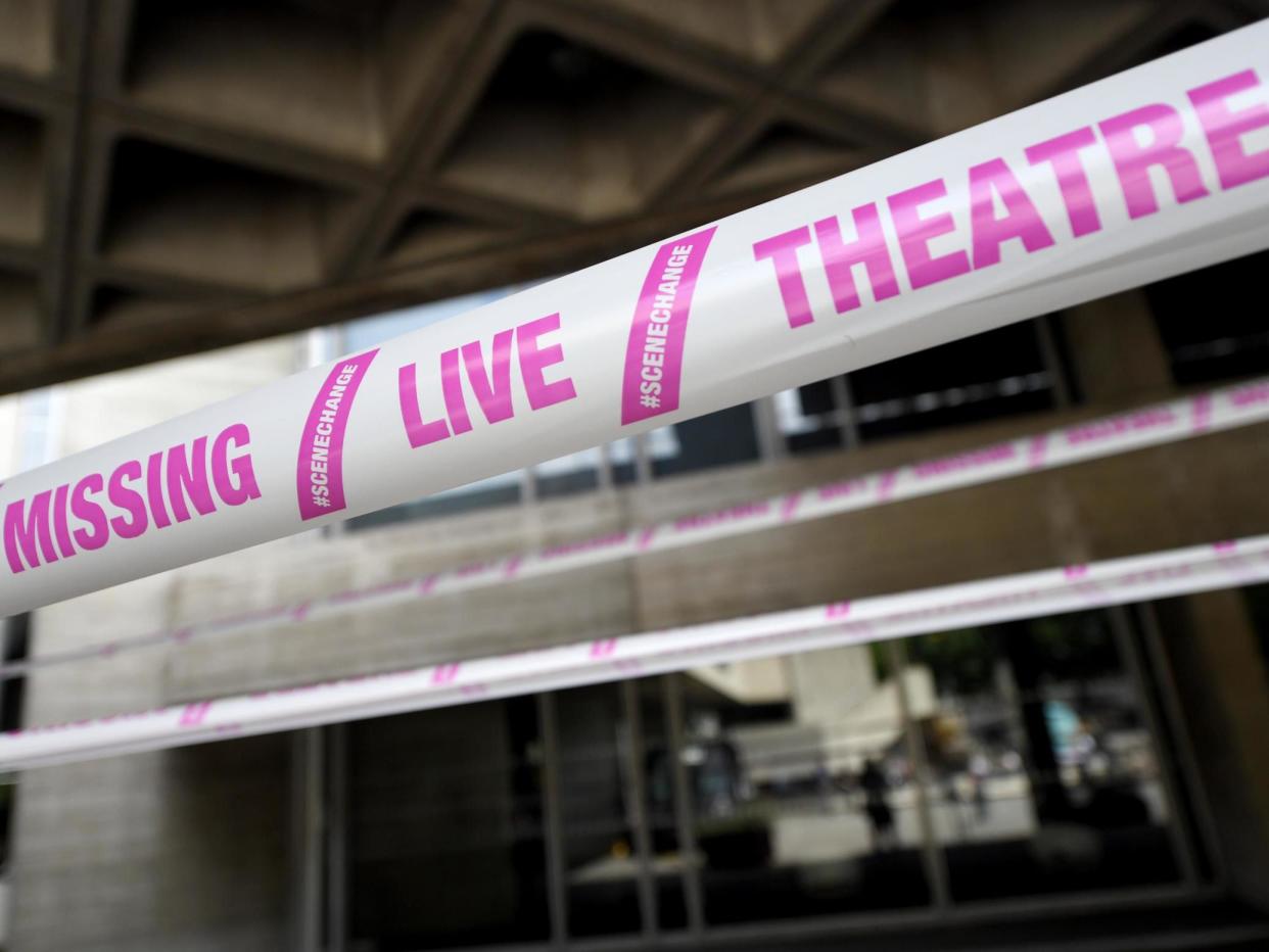 The National Theatre wrapped in pink tape as part of a campaign by #scenechange to help bring shows back into production: Rex Features