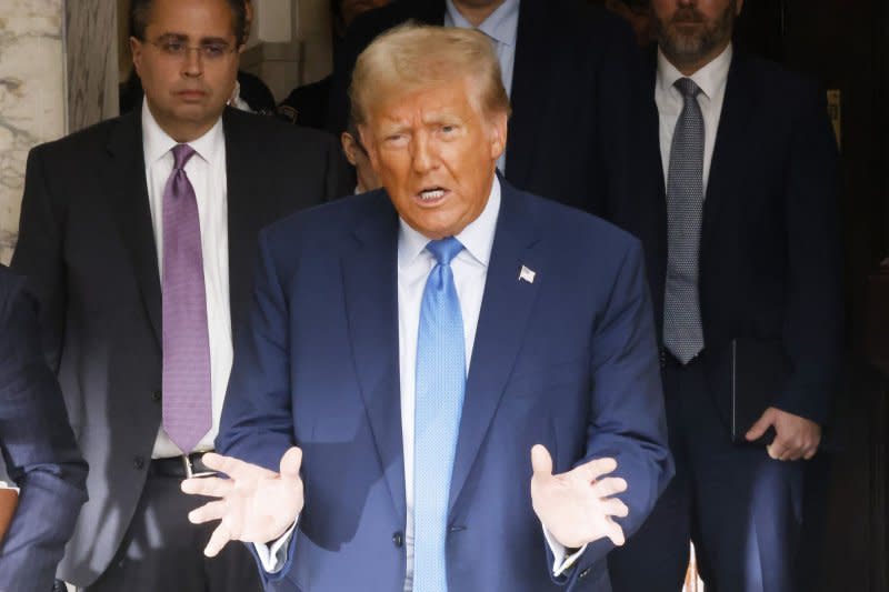 Former United States President Donald Trump speaks when he exits the courtroom after he testifies in his civil fraud trial at State Supreme Court on Monday, November 6, 2023 in New York City. The case brought last September by New York Attorney General Letitia James, accuses Trump, his eldest sons and his family business of inflating Trump's net worth by more than $2 billion by overvaluing his real estate portfolio. Photo by John Angelillo/UPI