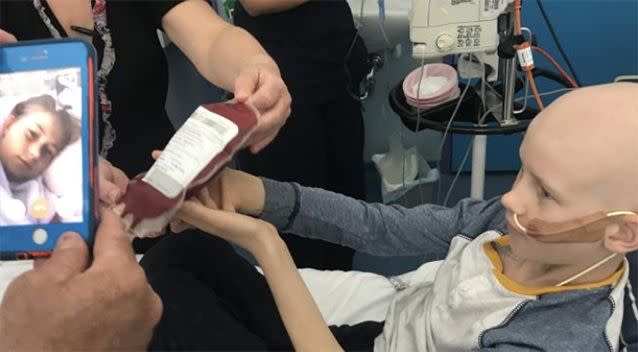 Ava watched on by mobile phone from another ward as Jack received the bone marrow. Source: Supplied