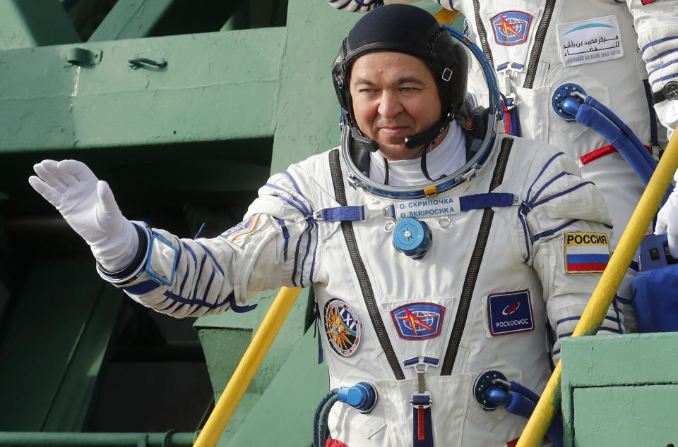 Russian cosmonaut Oleg Skripochka, a member of the main crew to the International Space Station (ISS), boards the Soyuz MS-15 spacecraft for the launch at the Russian leased Baikonur cosmodrome, Kazakhstan, Wednesday, Sept. 25, 2019. (Maxim Shipenkov/Pool Photo via AP)