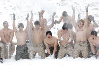 <p>American and South Korean marines goofed off during joint winter training exercises in Pyeongchang-gun, South Korea in January 2016.<br></p>