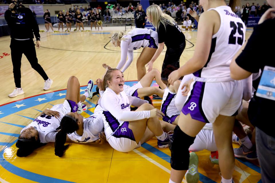 Bethany celebrates after winning the Class 4A girls state championship game against Lincoln Christian on Saturday at the State Fair Arena.