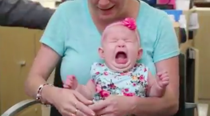 A video showing a baby getting her ears pierced has been slammed by some parents [Photo: Facebook/Piercings]