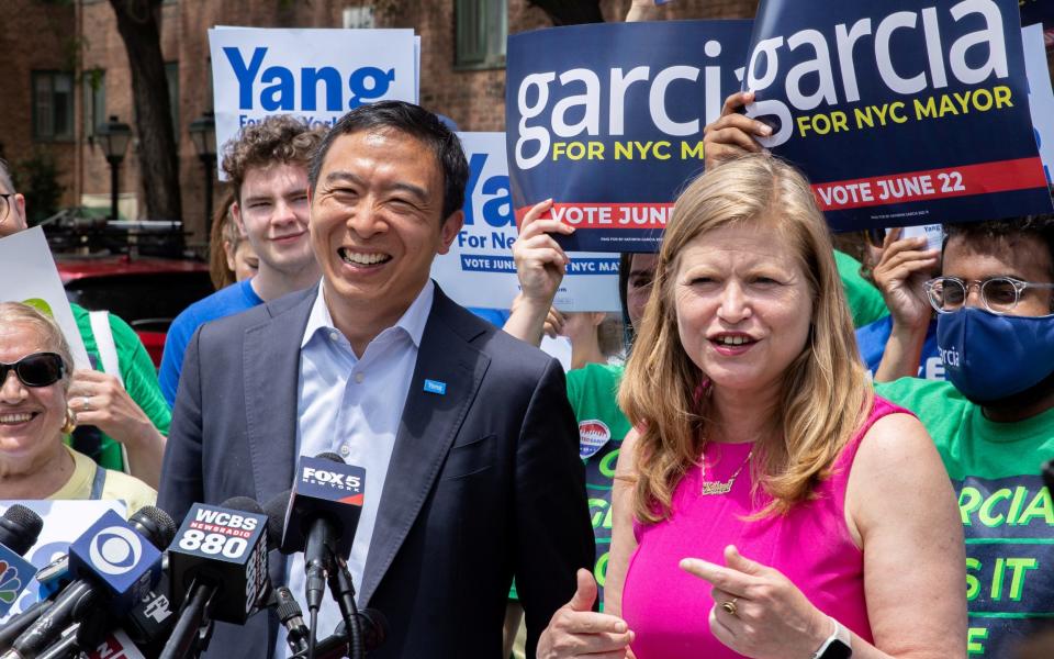 Andrew Yang and Kathryn Garcia, Democratic candidates for New York City Mayor, speak during a campaign appearance in New York City - Reuters