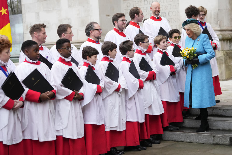 Queen Camilla meets some of the choristers following the annual Commonwealth Day Service of Celebration at Westminster Abbey in London, Monday, March 11, 2024. Commonwealth Day is an annual celebration observed by people all over the Commonwealth in Africa, Asia, the Caribbean and Americas, the Pacific and Europe. (AP Photo/Kirsty Wigglesworth)