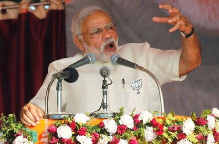 India's Prime Minister Narendra Modi gestures as he addresses an election campaign rally in Allahabad, India, February 20, 2017. REUTERS/Jitendra Prakash